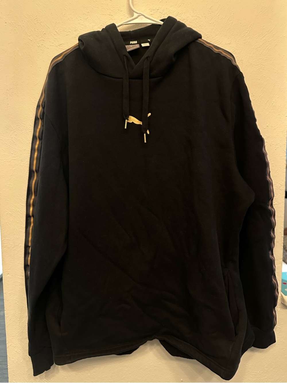 Puma Black Hoodie with Gold Contrast Stripe